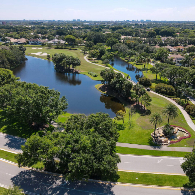 Aerial view across the landscaped Broken Sound community in Boca Raton